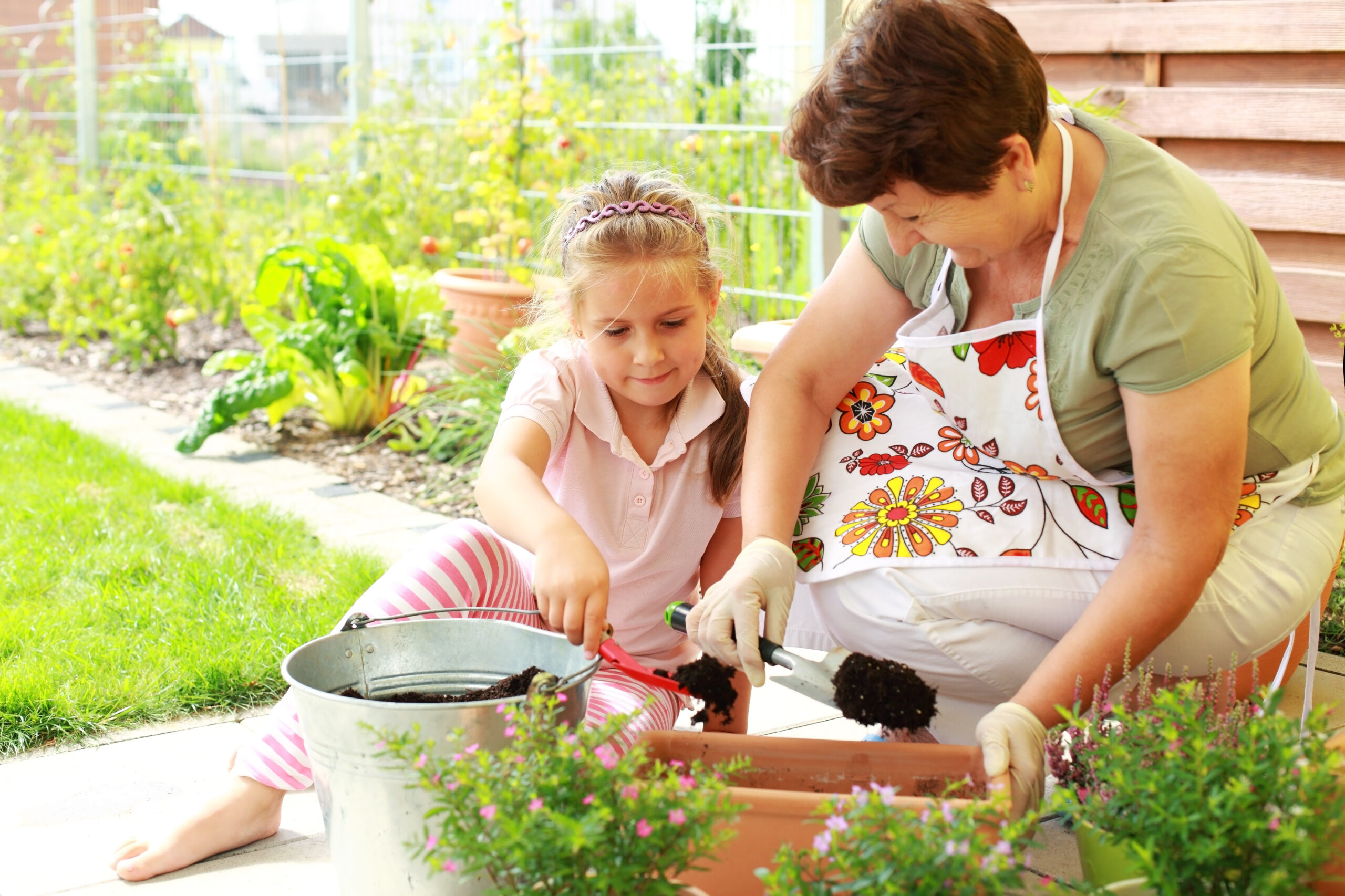 Child helps by replanting